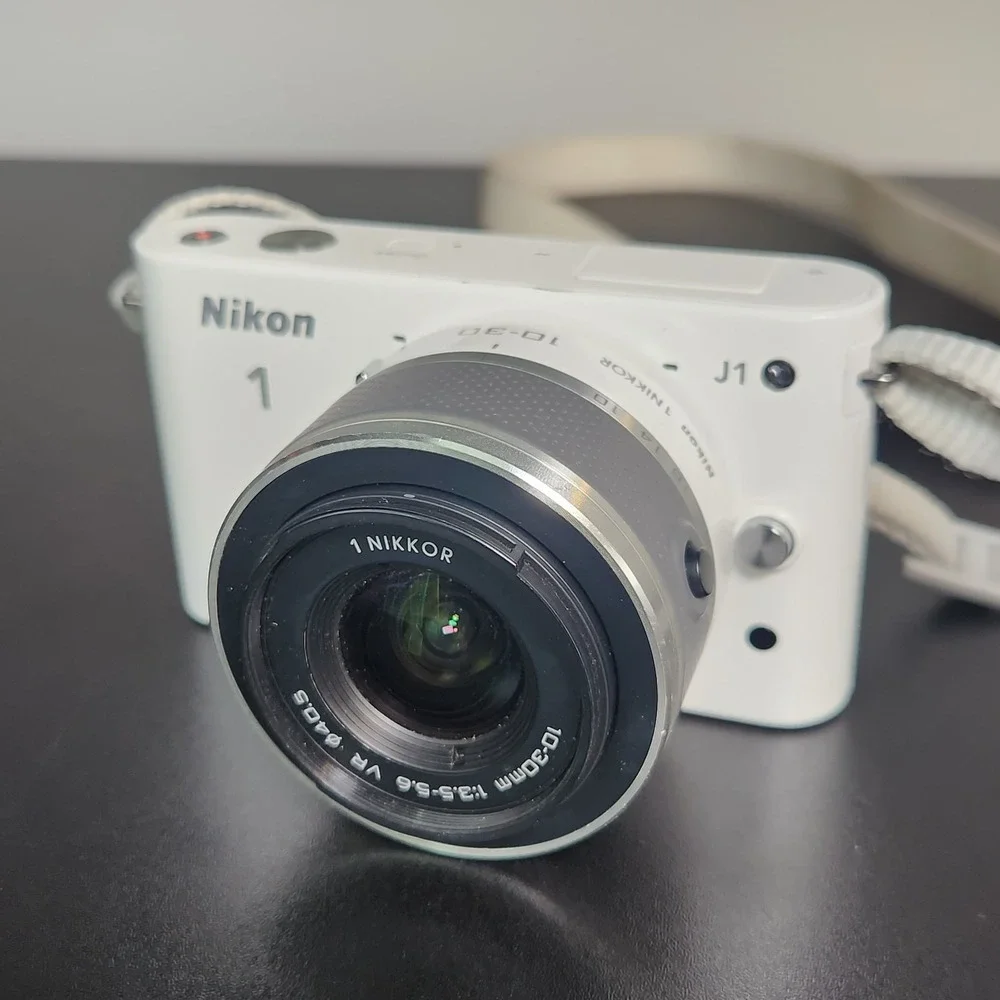 Nikon 1 J1 Digital Camera White w/ 10-30 & 30-110 Lens Hood 3 Batteries SD Card